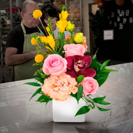 cheerful spirit june 24th & 27th the cymbidium with be substituted with another flower.